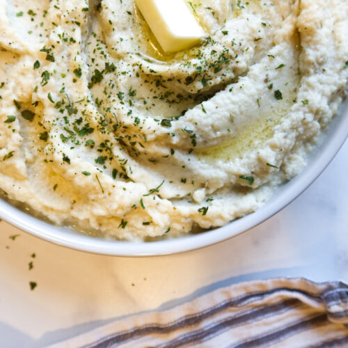 Mashed cauliflower in a serving dish.