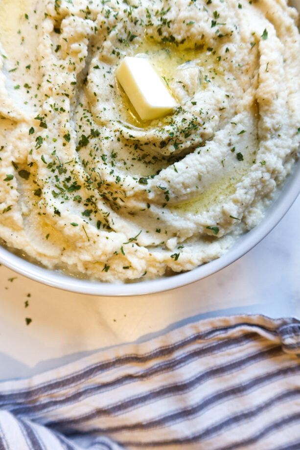 Mashed cauliflower in a serving dish. 