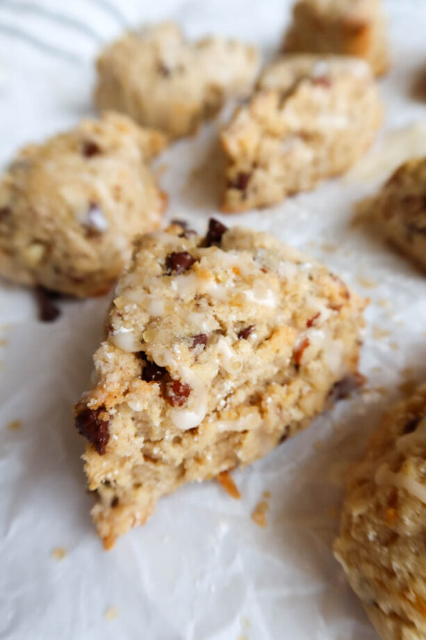 Close up of a mini scone atop crinkled white parchment paper.