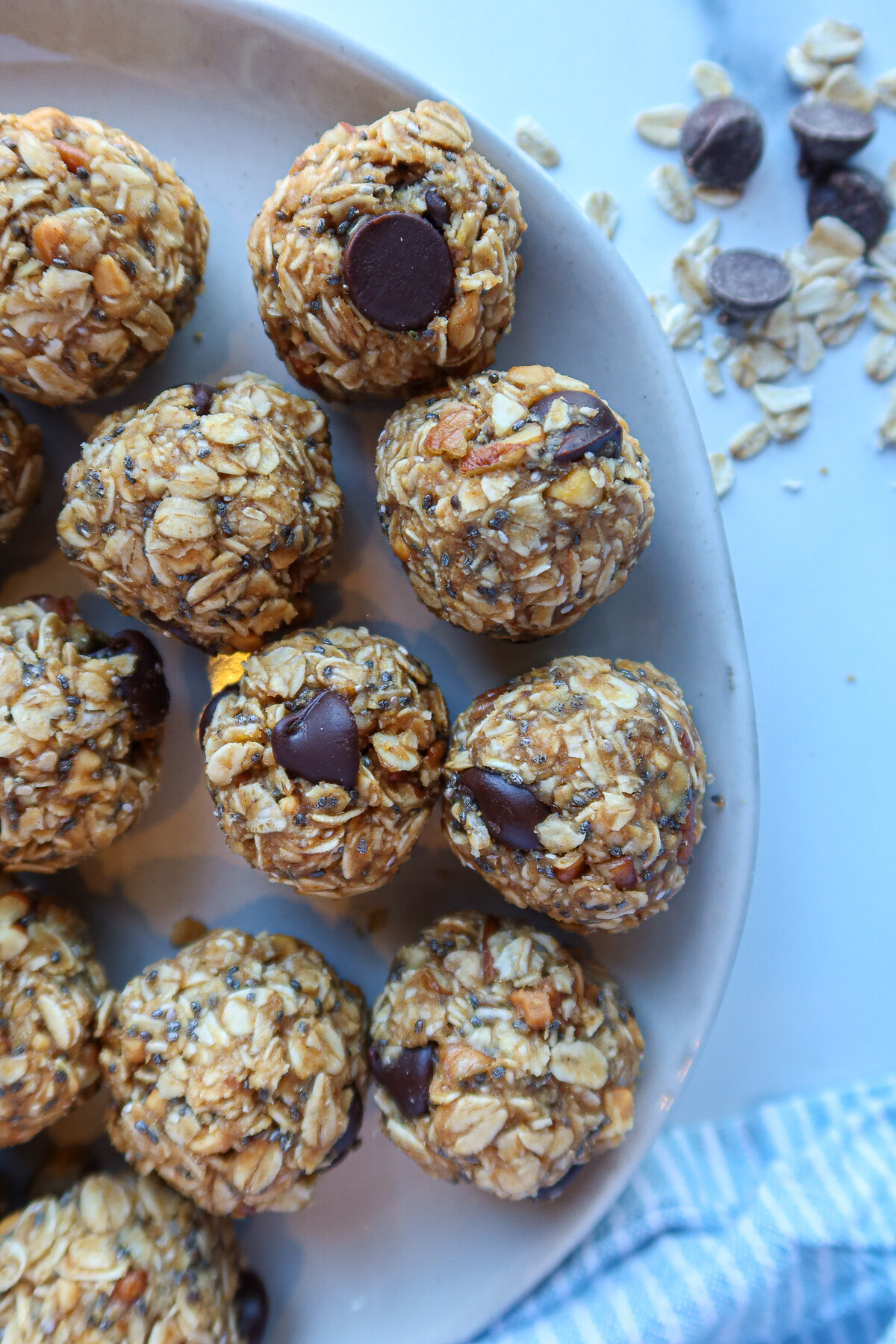 Peanut butter oatmeal balls on a white plate.