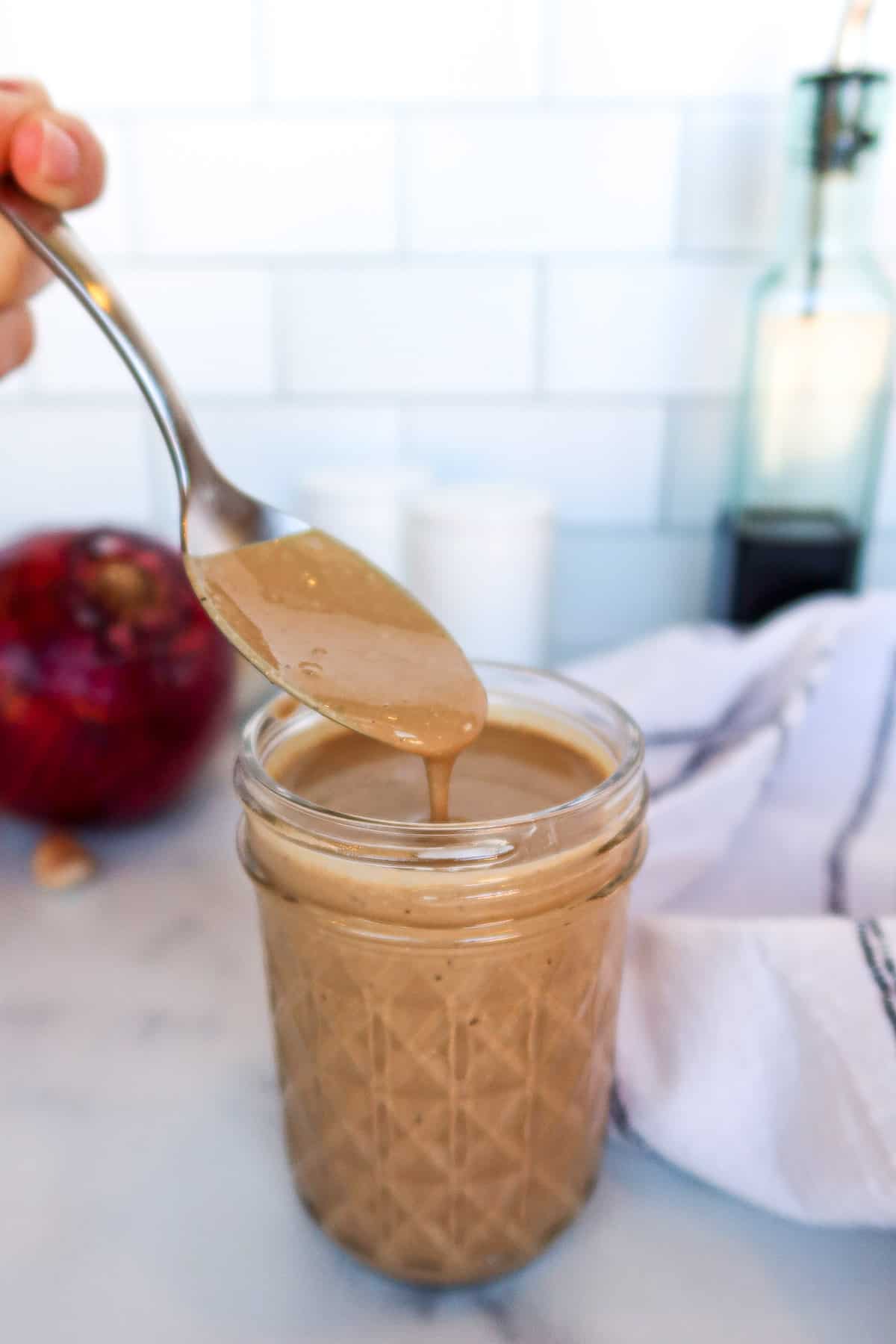 Creamy balsamic in a glass jar.