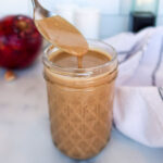 Greek yogurt balsamic dressing in a glass jar.