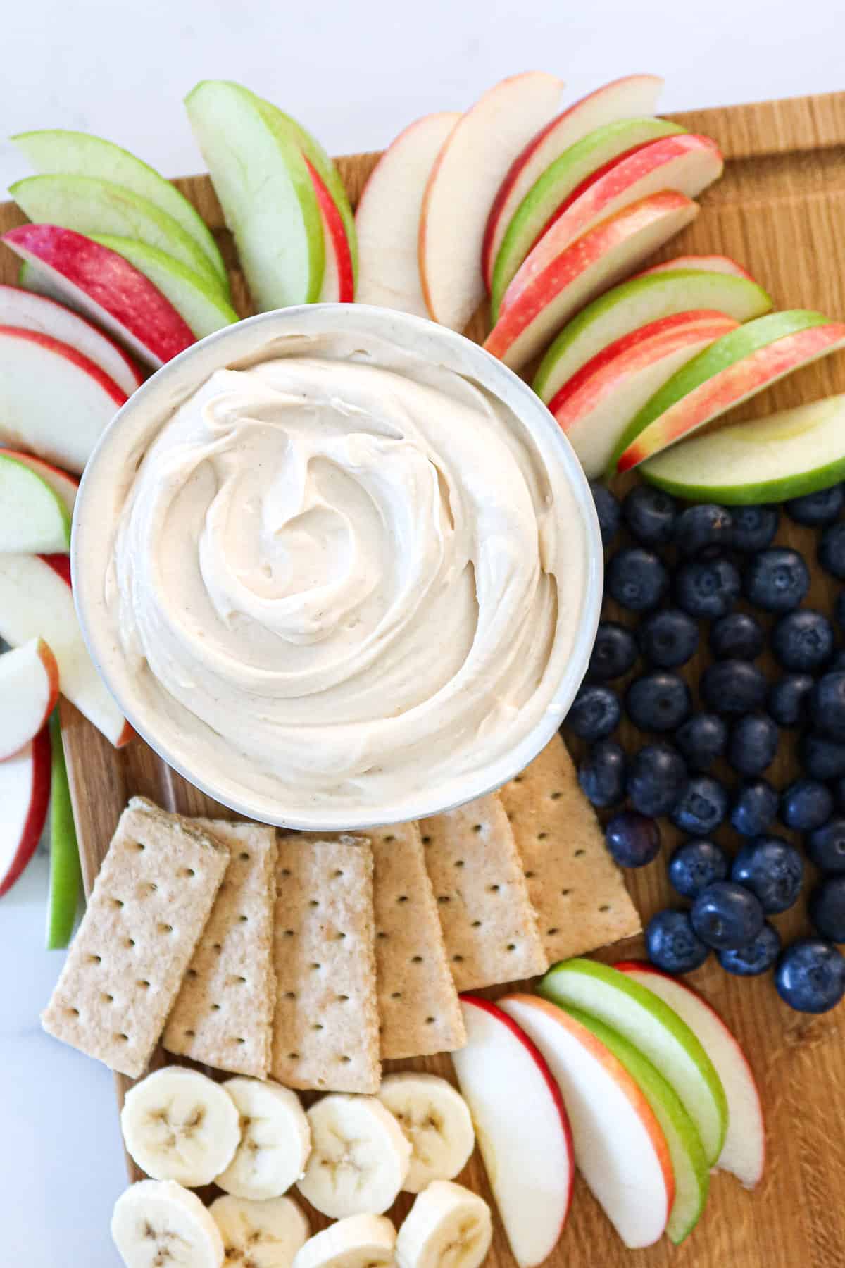 Peanut butter yogurt dip, fruit and graham crackers.