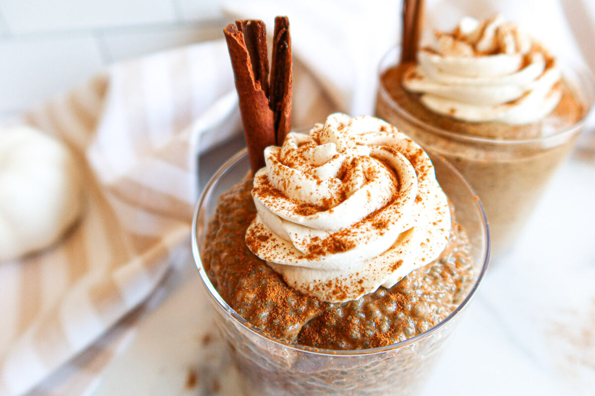 Chia pudding in serving glasses with toppings.