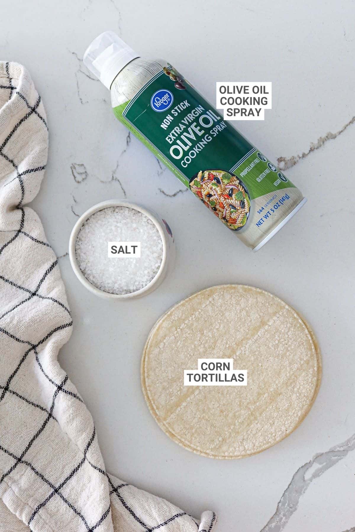 Ingredients for tostada shells with text overlay labels.