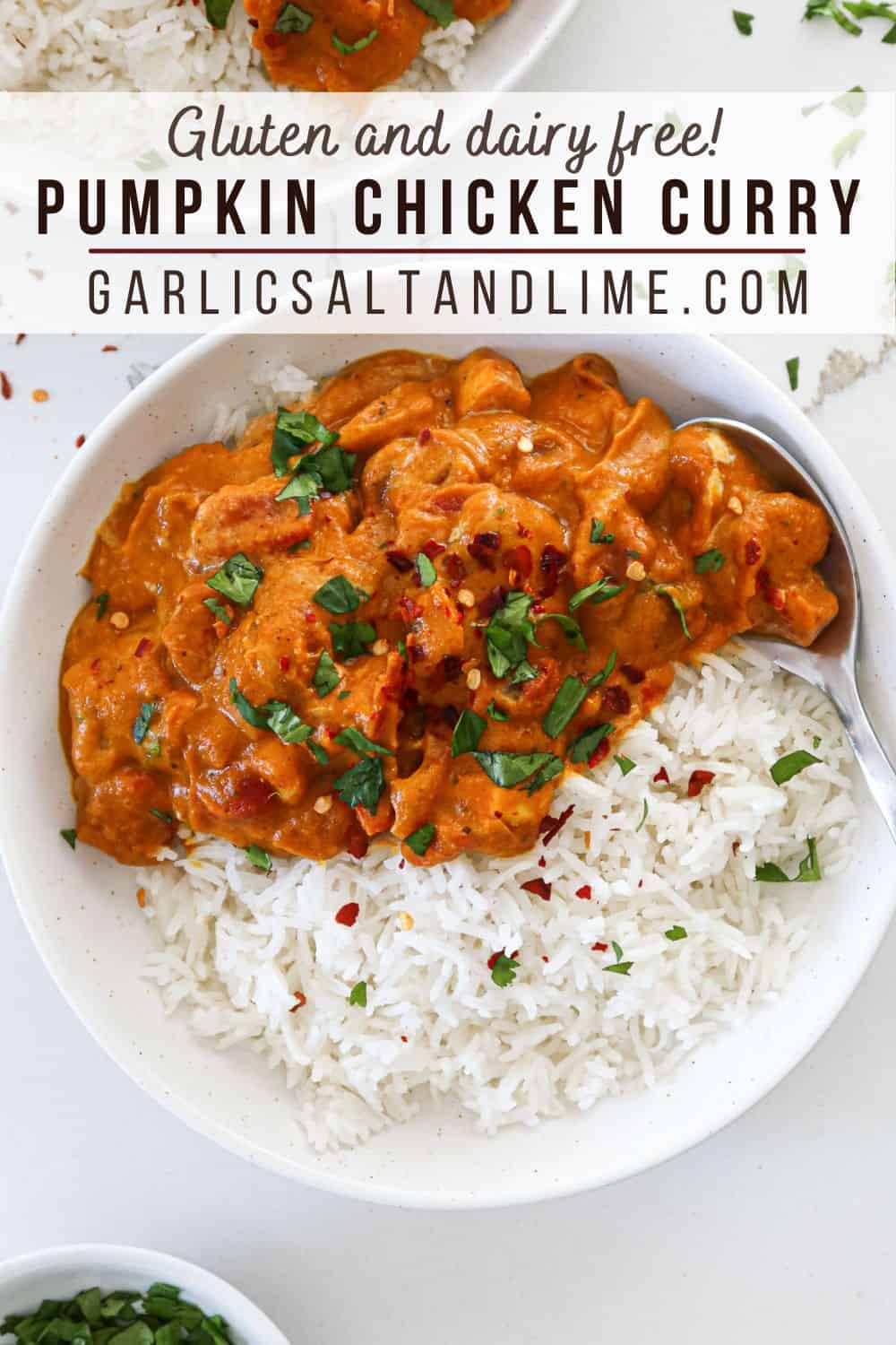 Bowl of pumpkin chicken curry and rice with text overlay for Pinterest.