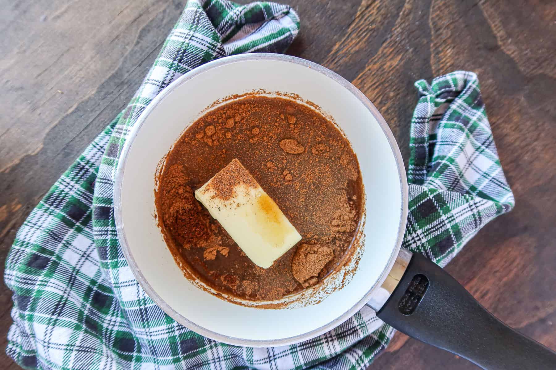 Sauce ingredients measured into small pan.