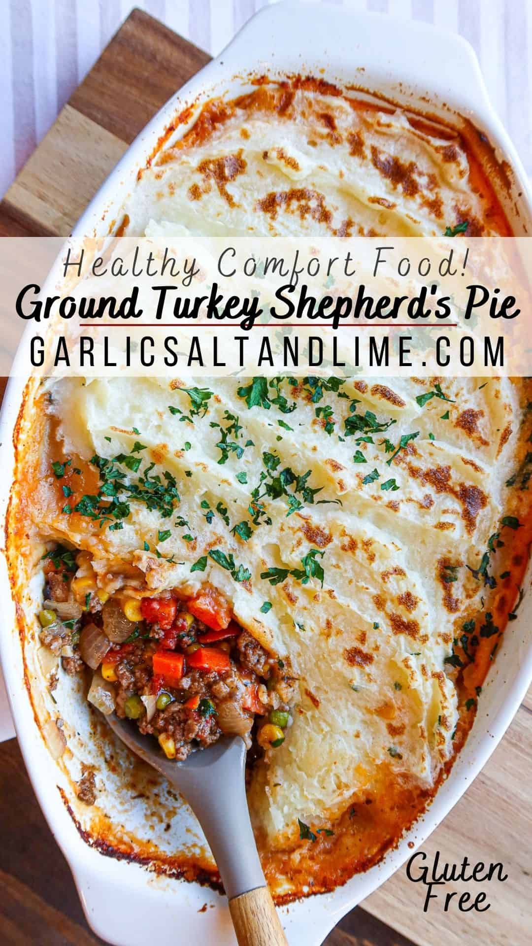 Shepherd's pie in a white baking dish with text overlay for Pinterest.