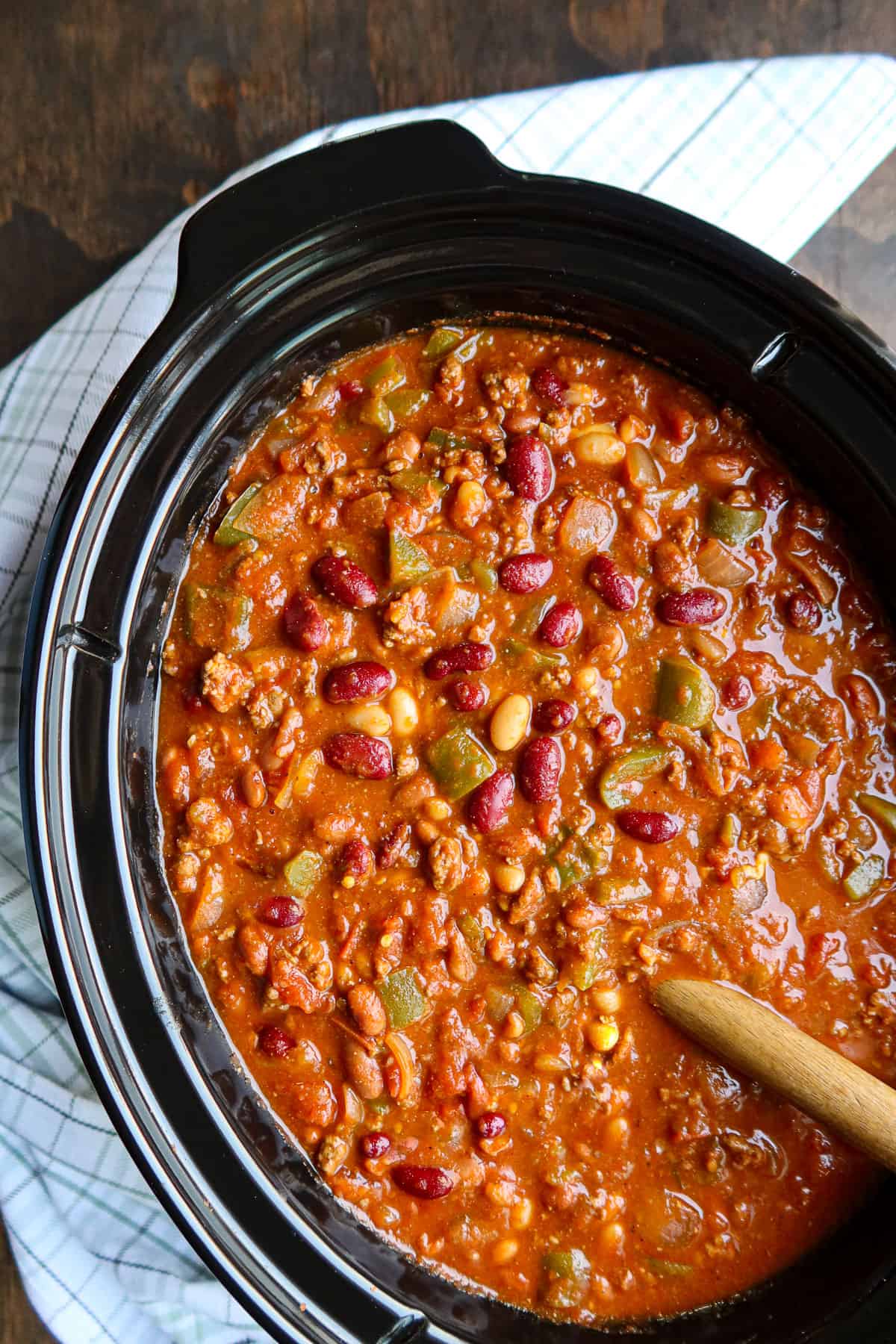 Chili in a black crockpot.