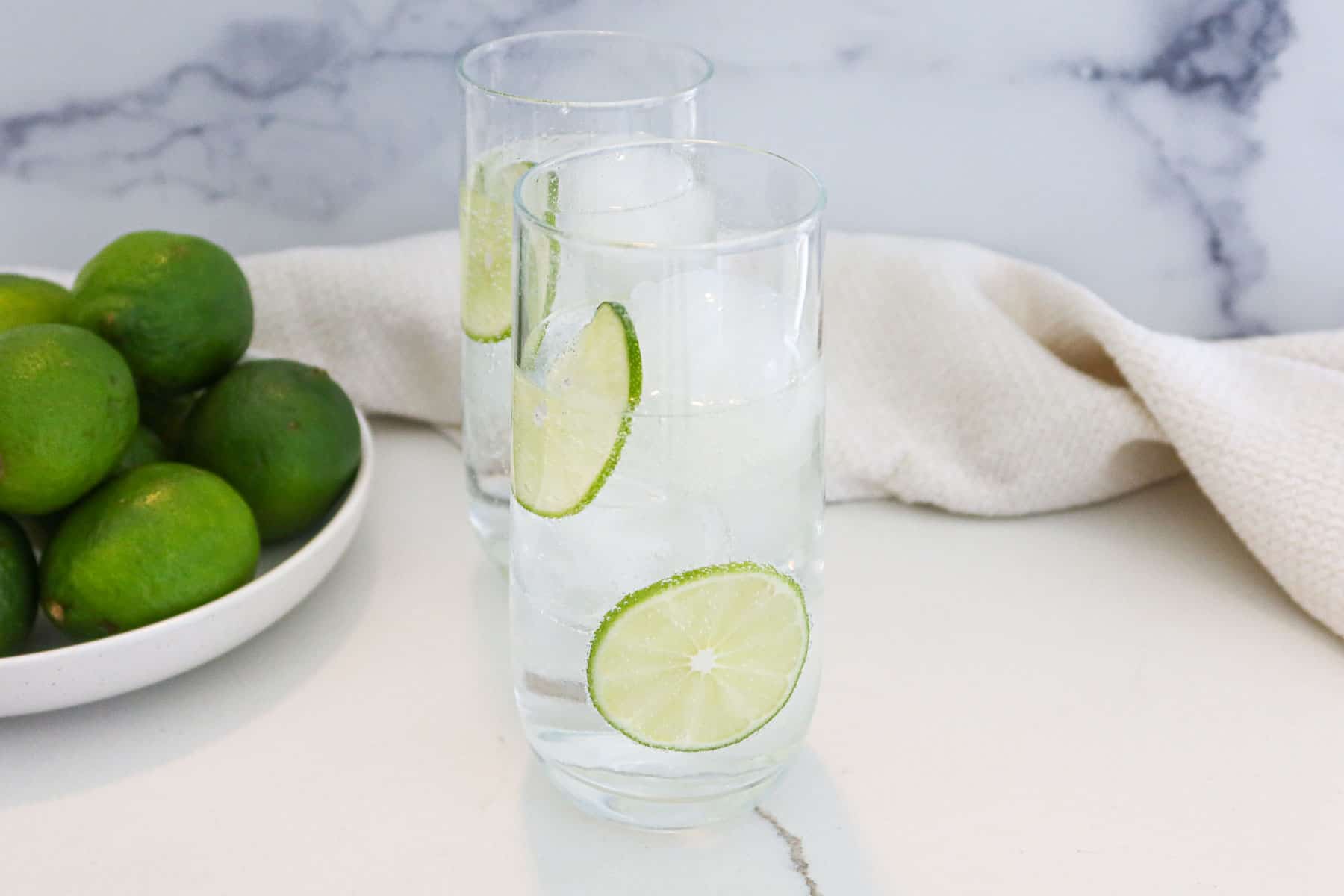 Tequila soda in clear drinking glasses.