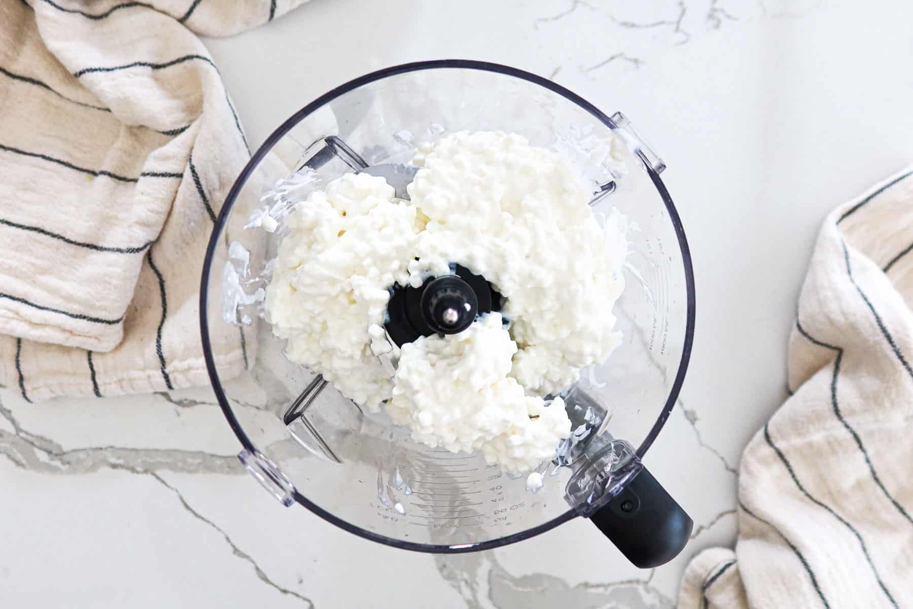 Cottage cheese in a food processor.