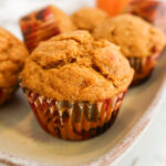 Close up of a pumpkin banana muffin.