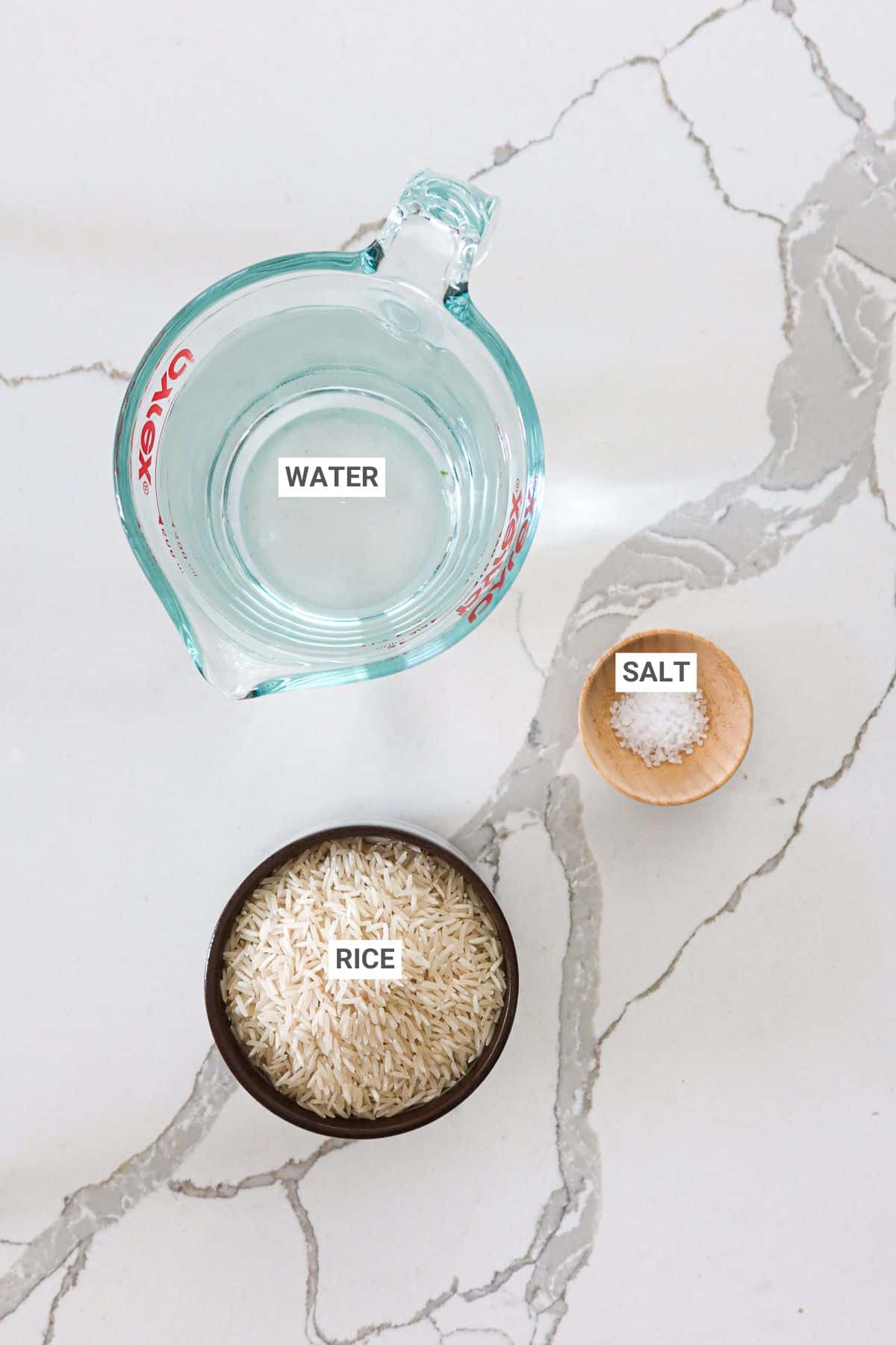 Ingredients for baked rice with text overlay labels.