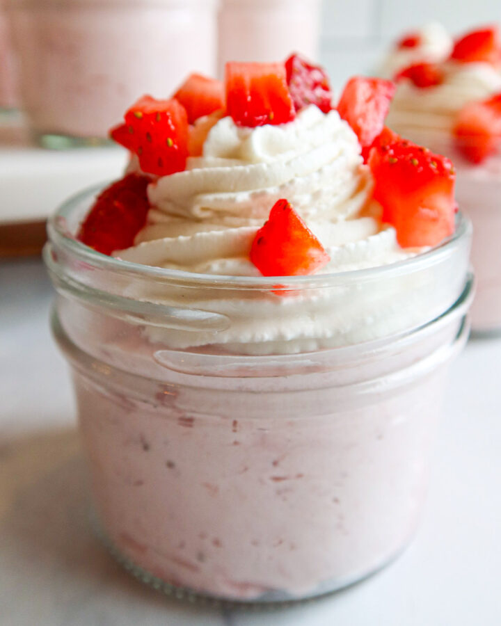 Strawberry cheesecake jar close up.