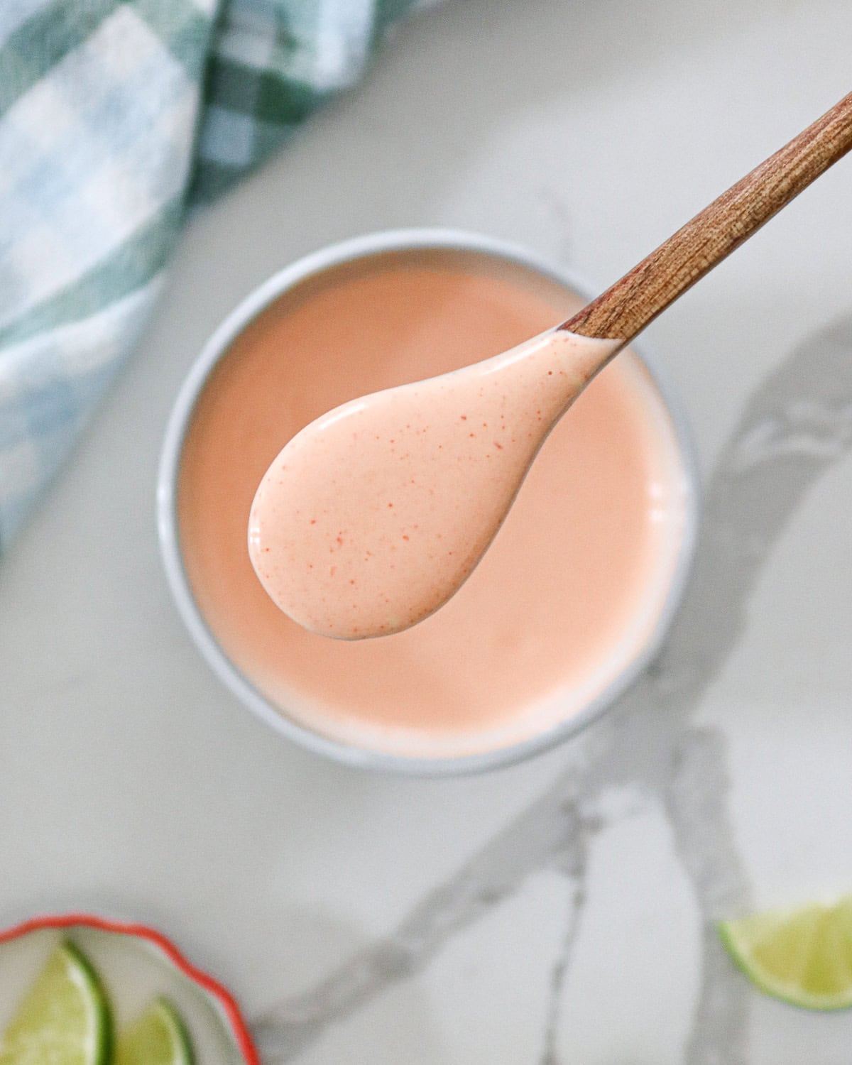 Spoonful of sriracha aioli close up.