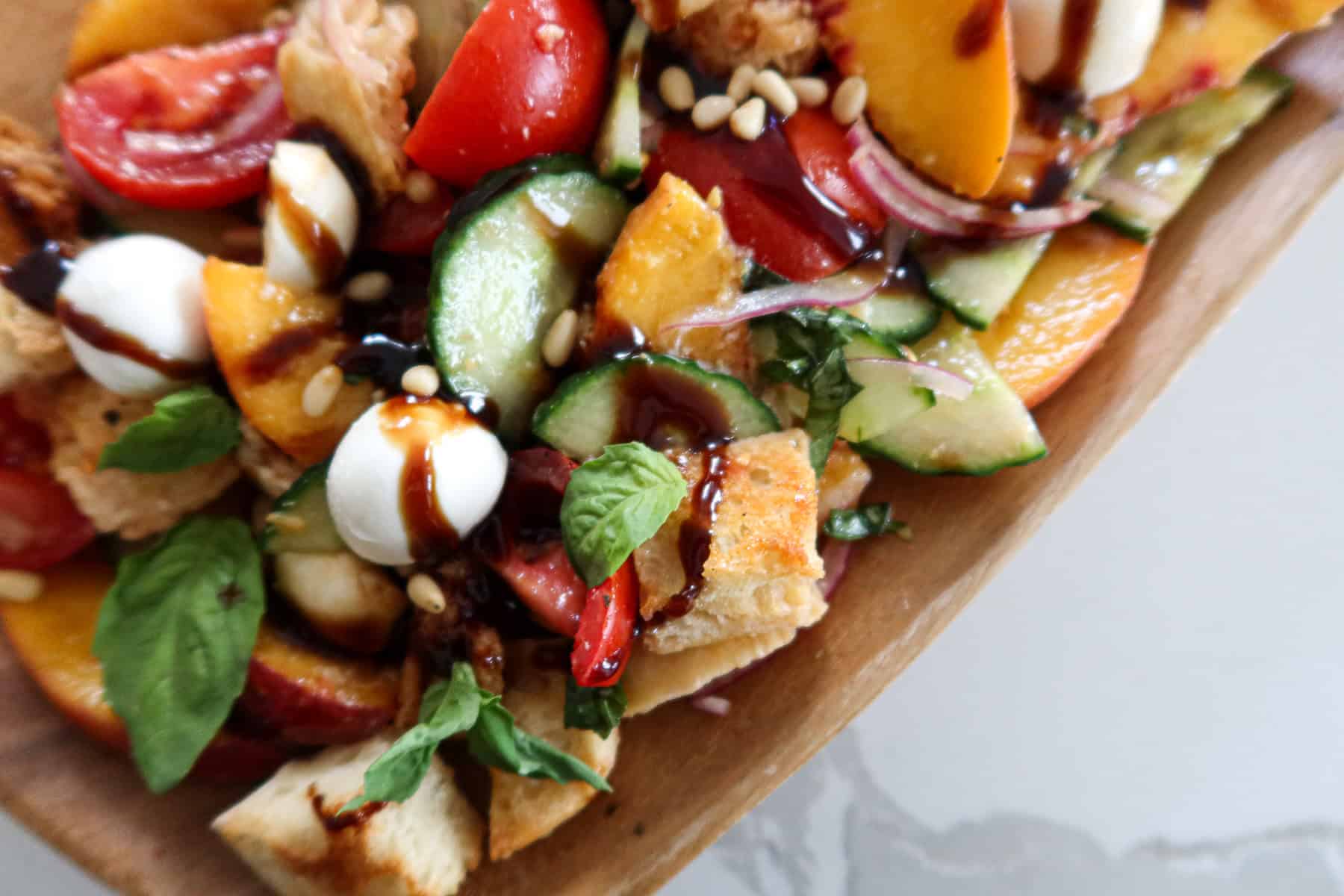 Peach panzanella salad.