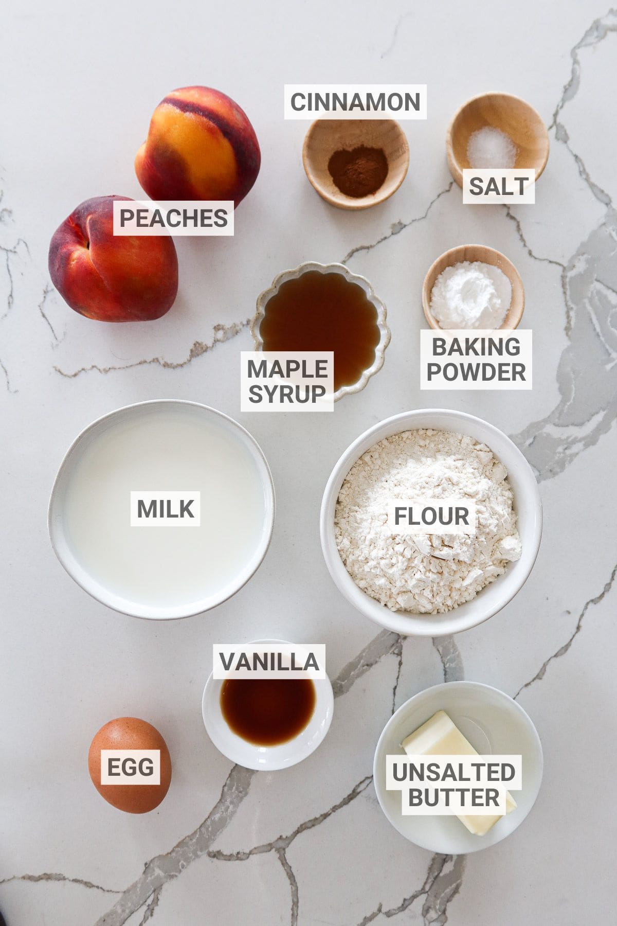 Peach pancake ingredients on a white countertop with text overlay labels.