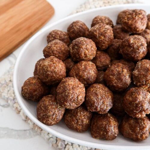 Egg free meatballs on a white serving plate.