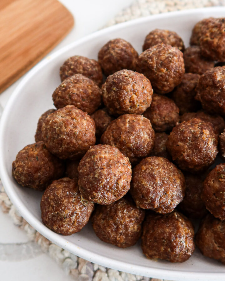 Egg free meatballs on a white serving plate.