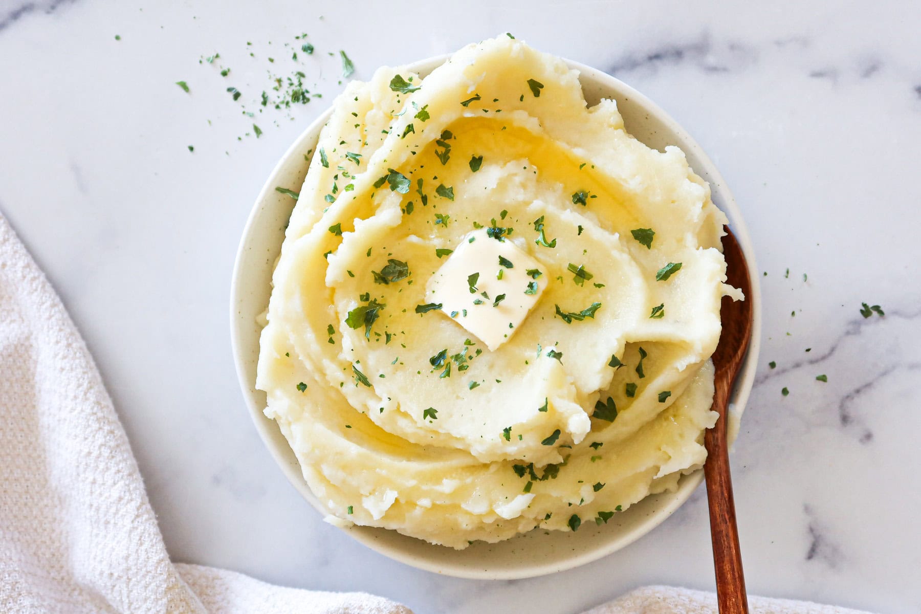 Dairy free mashed potatoes in a white serving dish.