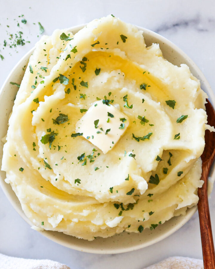 Dairy free mashed potatoes in a white serving dish.
