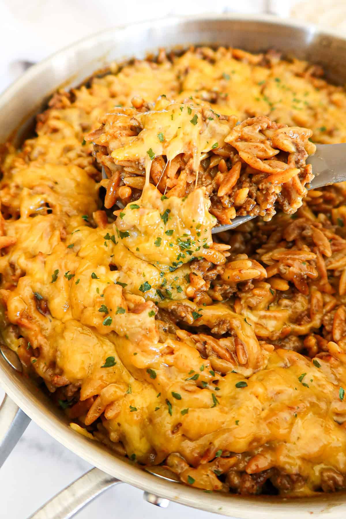 A spoonful of cheesy Mexican orzo.