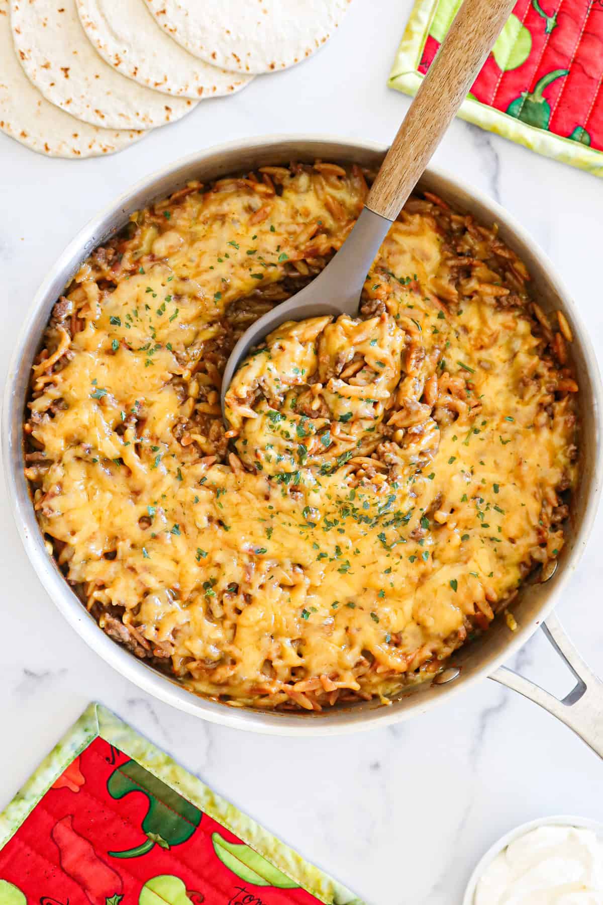 Taco orzo in a skillet.