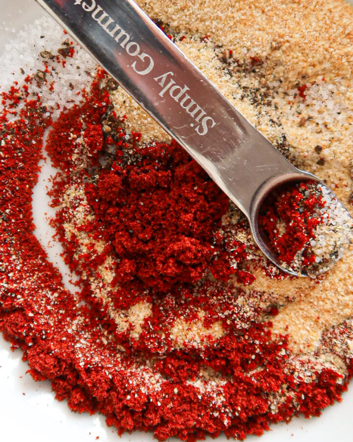Mixing spices together.