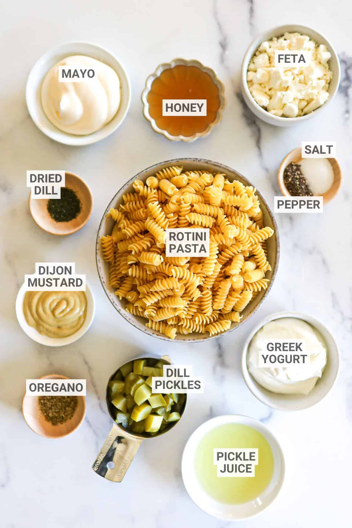 Dill pickle pasta salad ingredients with text overlay labels.
