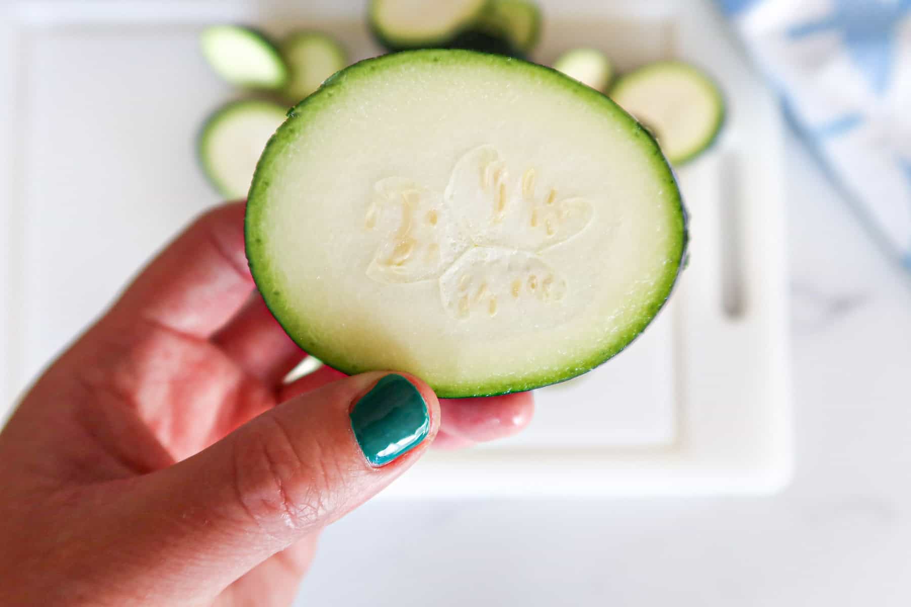 A cut piece of zucchini close up.