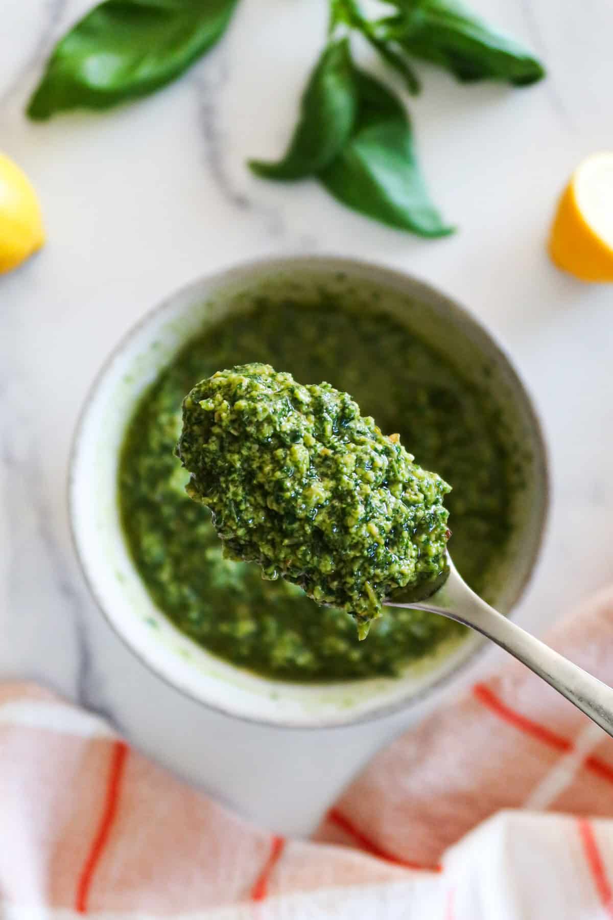 A big spoonful of homemade basil pesto.