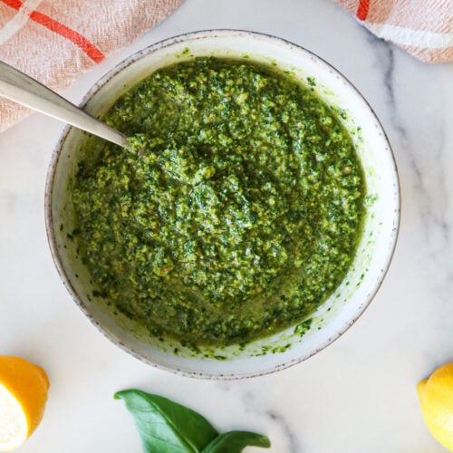 A bowl full of homemade pesto.