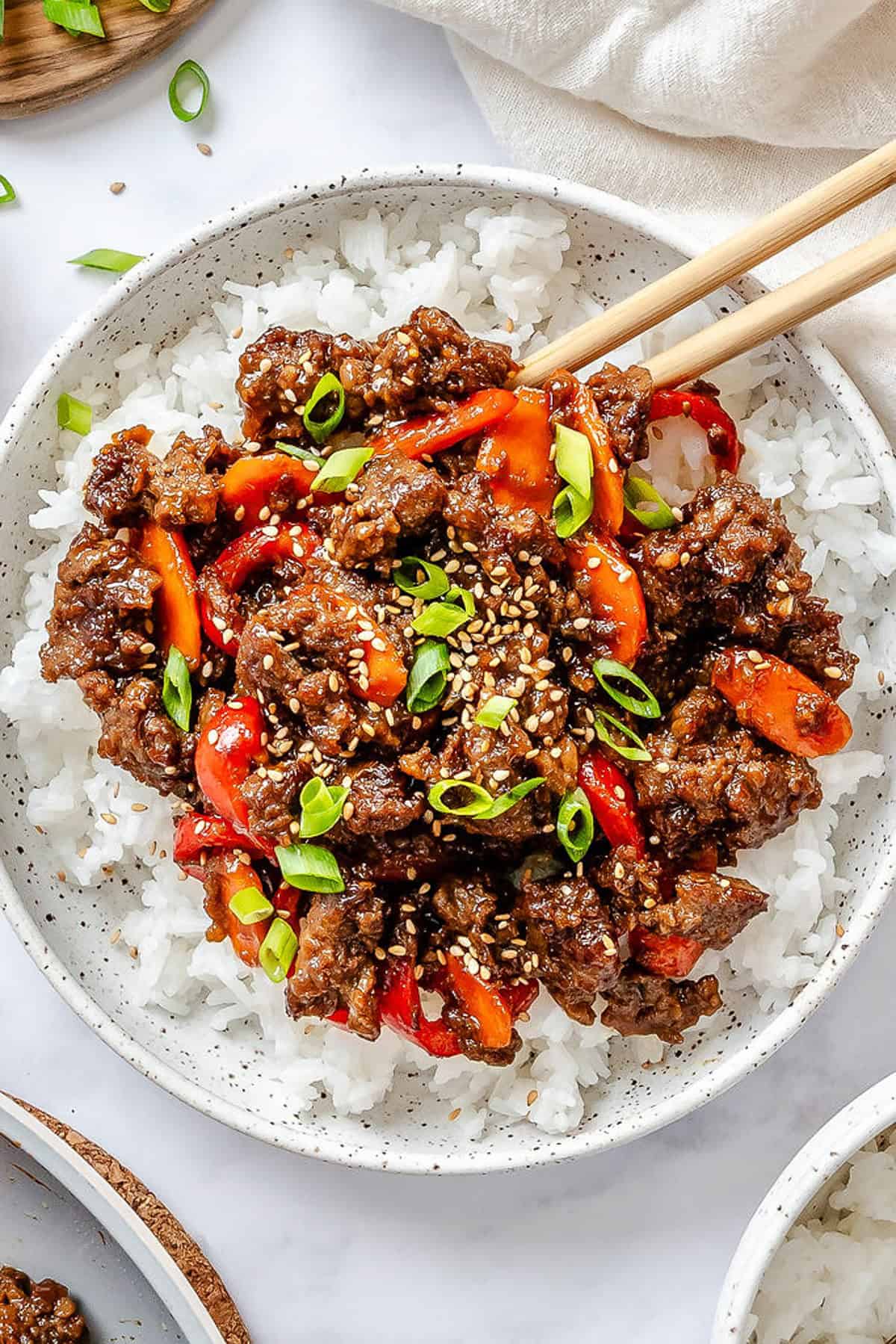 Teriyaki ground beef stir fry over white rice.